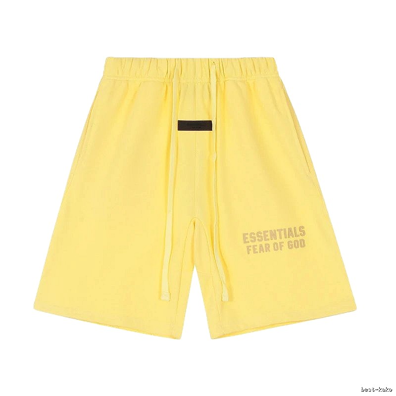 ESSENTIALS minimalist style yellow shorts