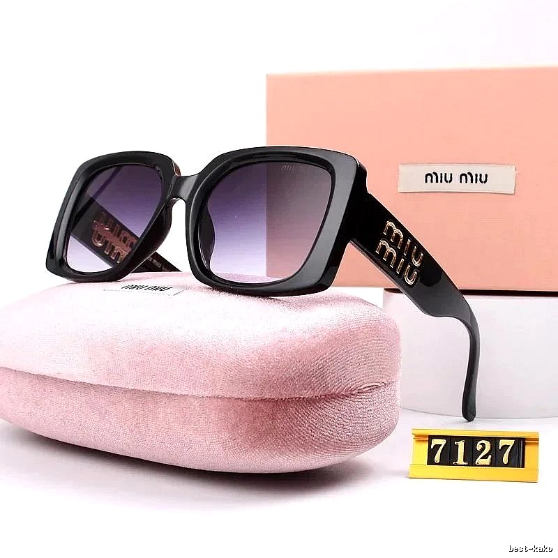 Miu Miu Compact Oversized sunglasses Black Oval Sunglasses for Smart Casual Looks