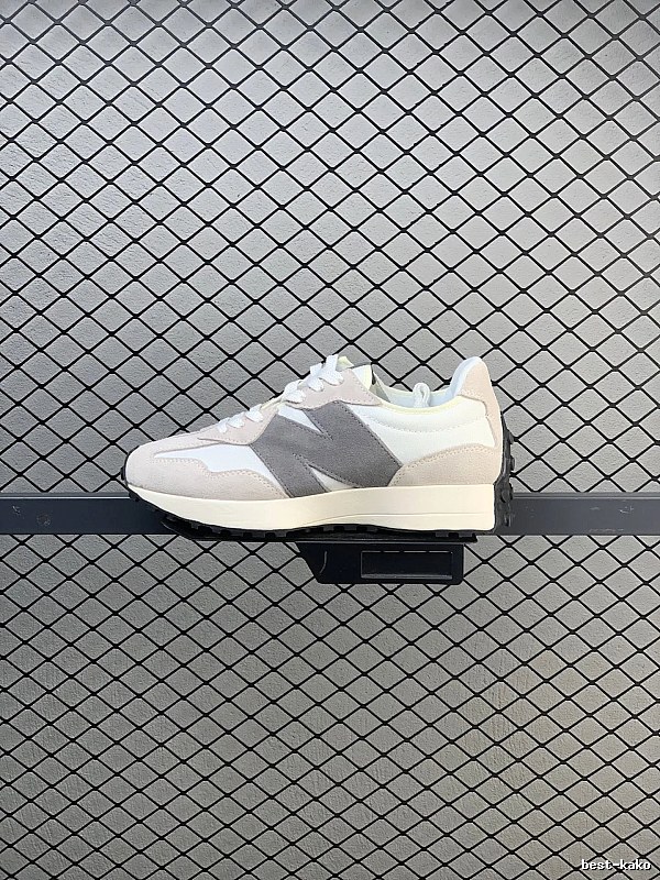 New Balance Gray Retro Runners Highlighting Road Runner Profile